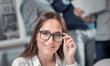 Alert woman writing in her notebook